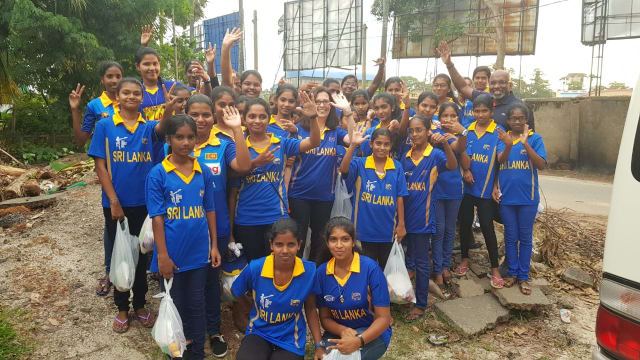 Group photo in cricket uniforms